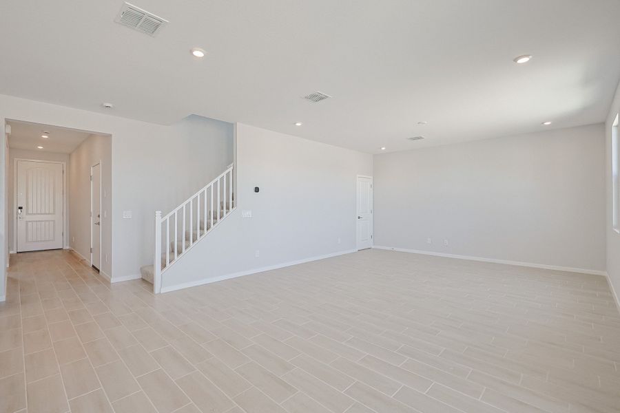 A long hallway with white walls. A long hallway with white walls.