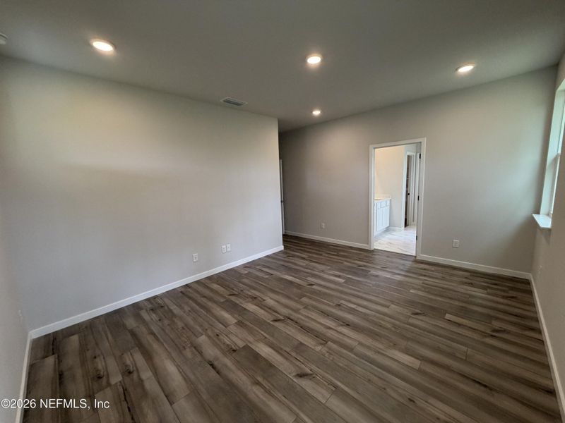 Spacious, unfurnished interior of a new home in Reserve East, Flagler Beach (Image 53).