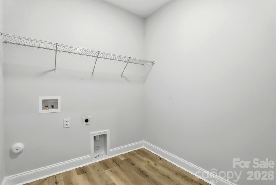 laundry room off the primary laundry room off the primary