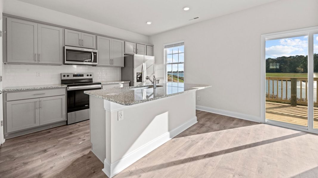 Furnished interior view inside a new home in Tyler - Home on the Lake, New Bern (Image 2). Furnished interior view inside a new home in Tyler - Home on the Lake, New Bern (Image 2).