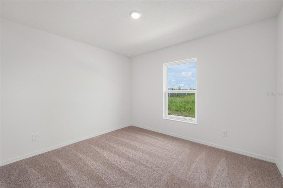 Spacious, unfurnished interior of a new home in Gum Lake Preserve, Lake Alfred (Image 15).