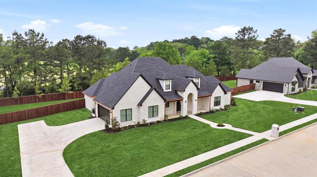 Front exterior of a new home in , Longview, TX, highlighting curb appeal (Image 2). Front exterior of a new home in , Longview, TX, highlighting curb appeal (Image 2).