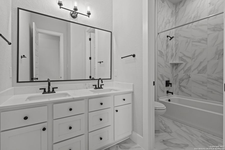 Furnished interior view inside a new home in Homestead, Schertz (Image 6).