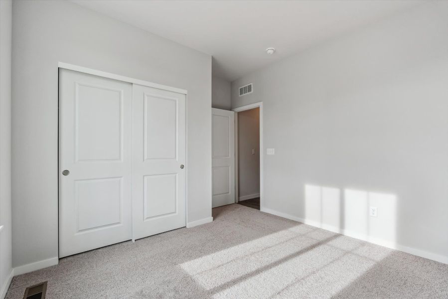 A room with white doors.