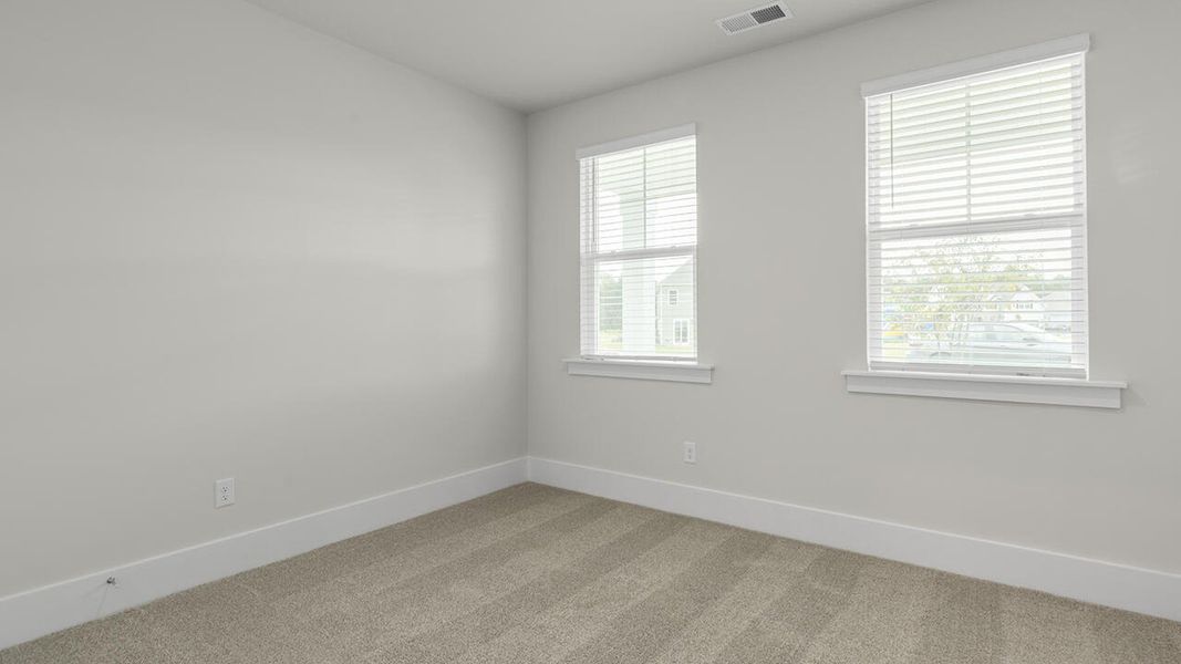 Spacious, unfurnished interior of a new home in The Haven at Indigo Preserve, Leland (Image 29).