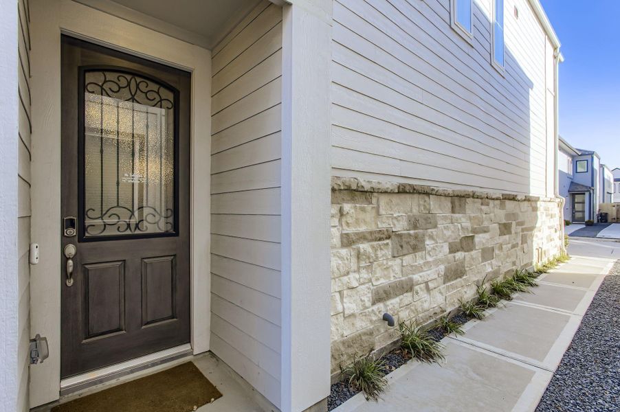 Exterior details and patio area of a home in , Houston (Image 26).
