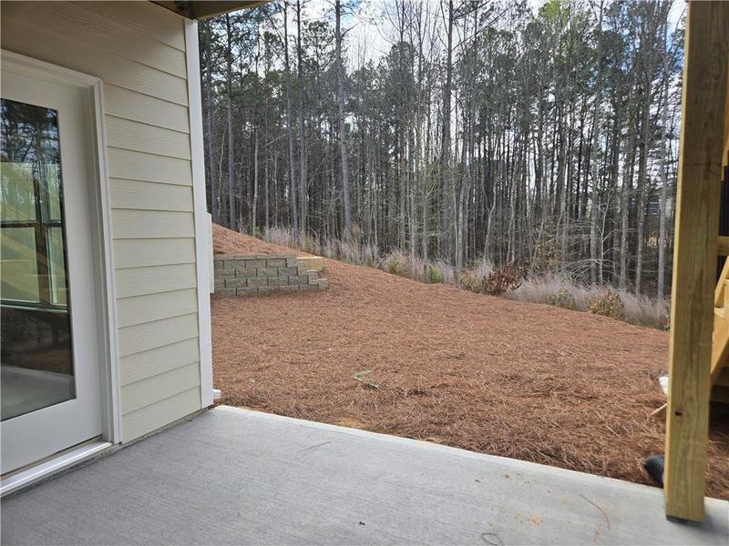 Exterior details and patio area of a home in Madeira, Acworth (Image 19).