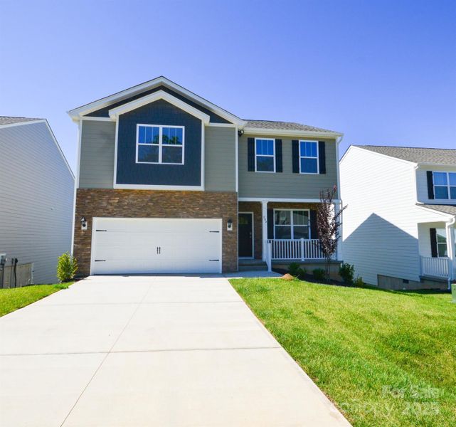 Exterior details and patio area of a home in Rydele Heights, Asheville (Image 2). Exterior details and patio area of a home in Rydele Heights, Asheville (Image 2).