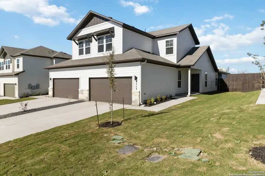 Front exterior of a new home in Emma Park, Buda, TX, highlighting curb appeal (Image 1). Front exterior of a new home in Emma Park, Buda, TX, highlighting curb appeal (Image 1).