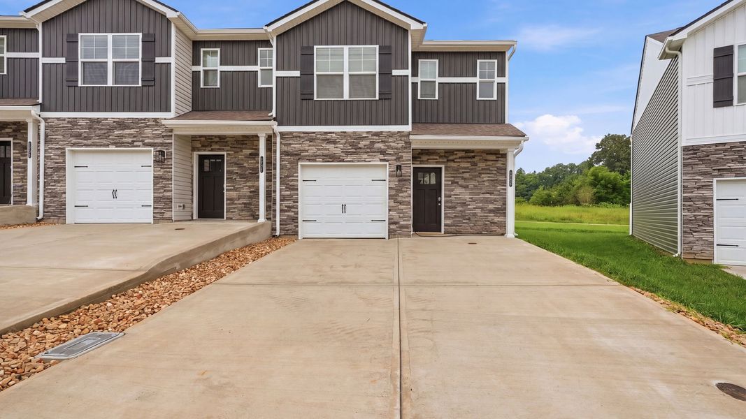 Front exterior of a new home in The Arbor Townhomes, Kingsport, TN, highlighting curb appeal (Image 16).