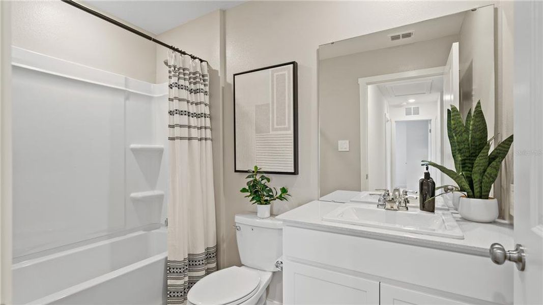 Furnished interior view inside a new home in Crosswinds, Haines City (Image 12).