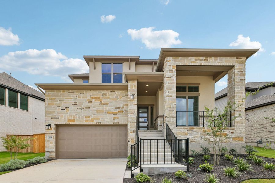 Front exterior of a new home in 6 Creeks, Kyle, TX, highlighting curb appeal (Image 18). Front exterior of a new home in 6 Creeks, Kyle, TX, highlighting curb appeal (Image 18).