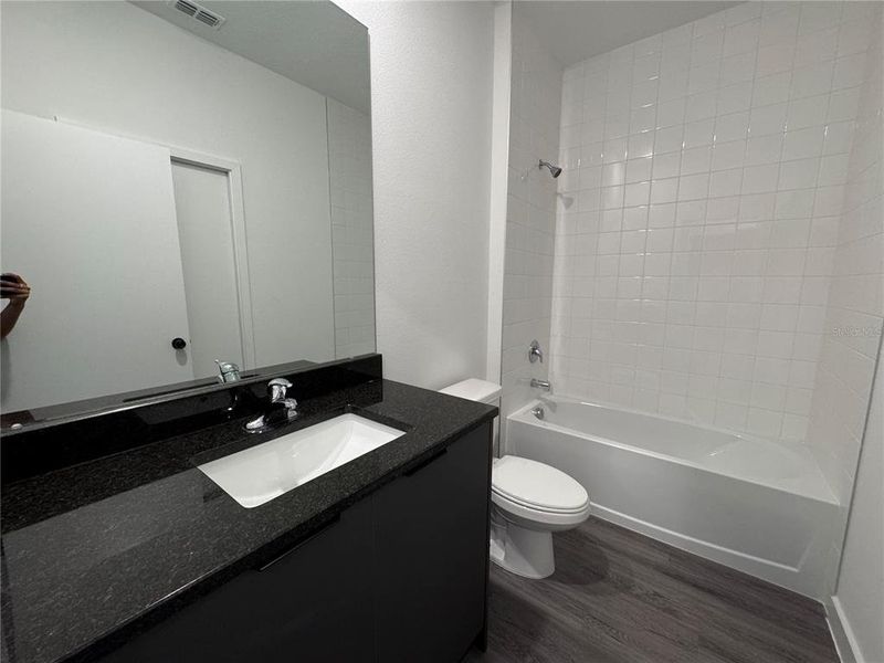Furnished interior view inside a new home in , Kissimmee (Image 6).