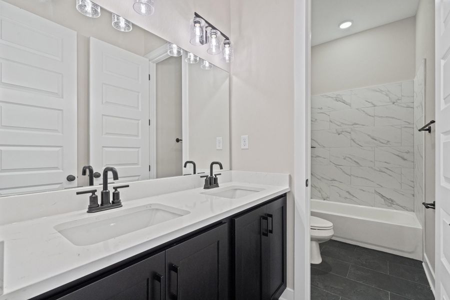 Furnished interior view inside a new home in Manor at Hall Creek, Arlington (Image 9).