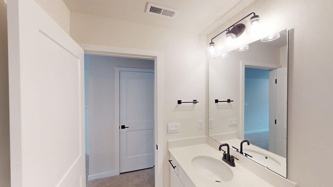 Representative furnished interior of a home built from the Cedar by D.R. Horton in Westport, York (Image 15).