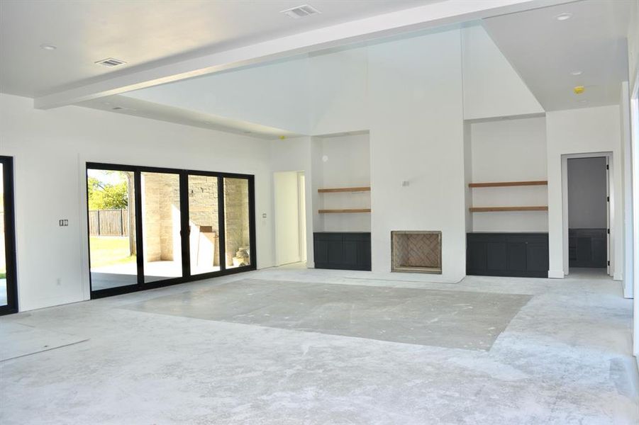 View of the living room with a fireplace