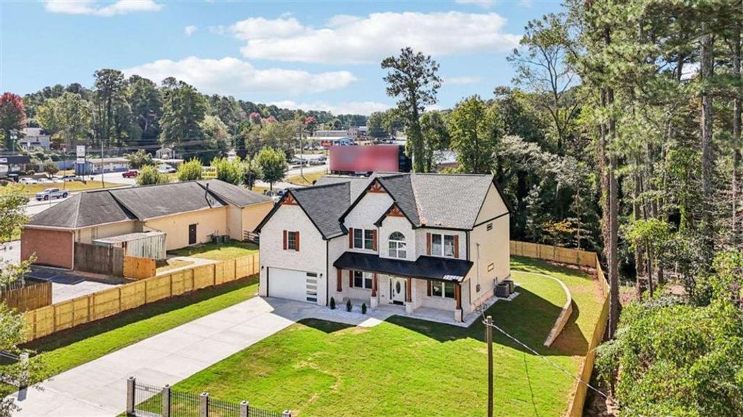 Front exterior of a new home in , Lilburn, GA, highlighting curb appeal (Image 30). Front exterior of a new home in , Lilburn, GA, highlighting curb appeal (Image 30).