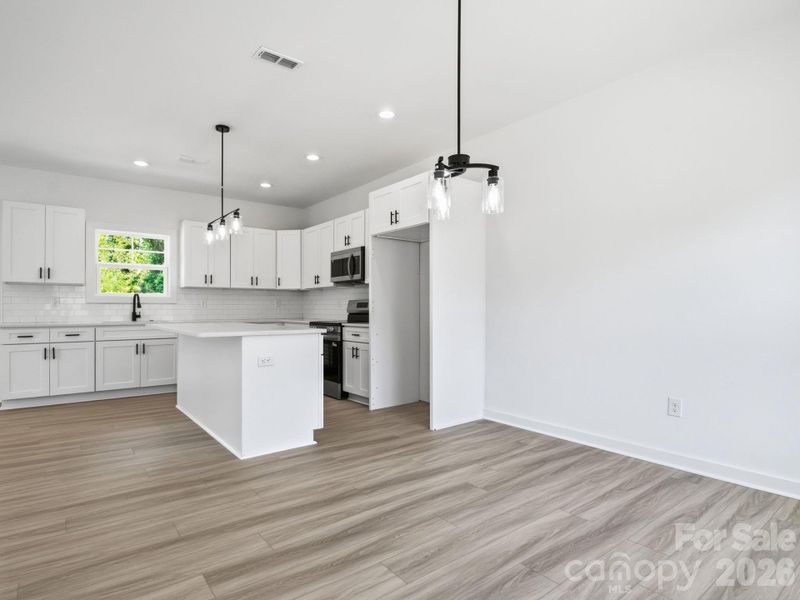 Furnished interior view inside a new home in , Charlotte (Image 7).
