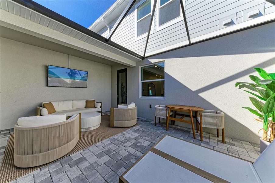 Exterior details and patio area of a home in Nautique at Waterside, Sarasota (Image 23).