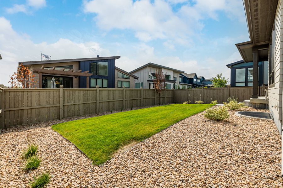 Front exterior of a new home in West Grange, Longmont, CO, highlighting curb appeal (Image 29).