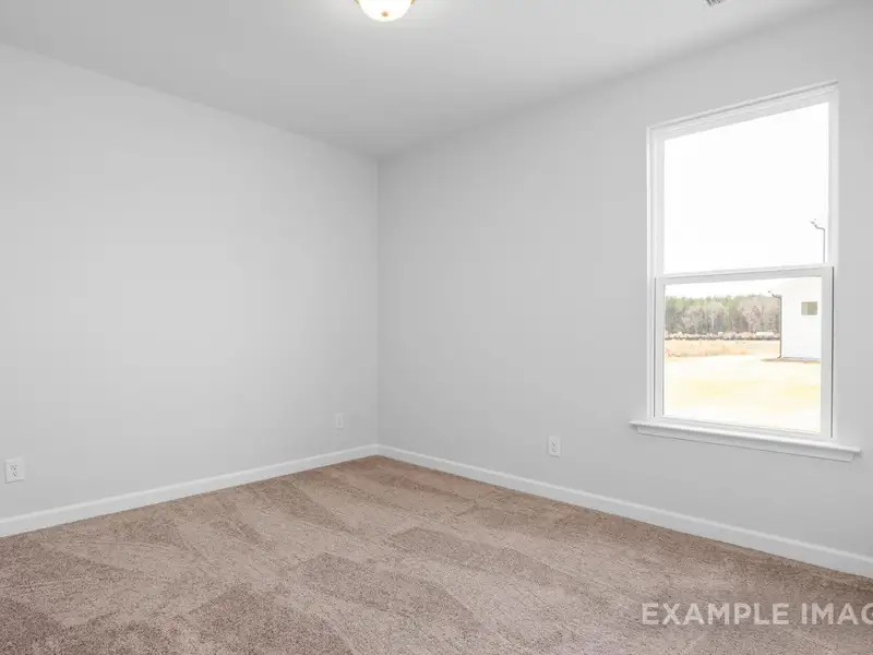 Spacious, unfurnished interior of a new home in Retreat at North Main, Lillington (Image 11).