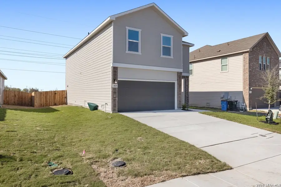 Front exterior of a new home in Woodside Farms, Seguin, TX, highlighting curb appeal (Image 2). Front exterior of a new home in Woodside Farms, Seguin, TX, highlighting curb appeal (Image 2).