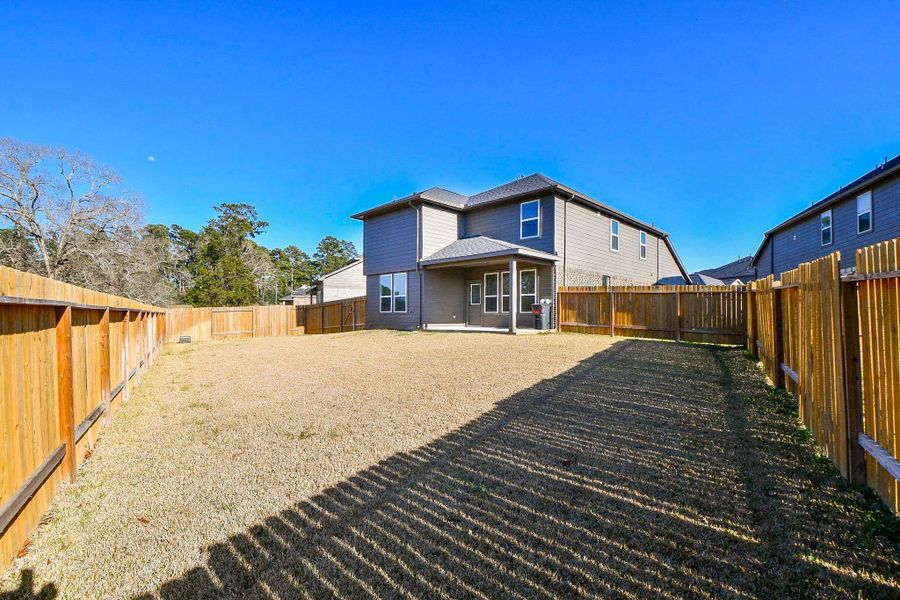 Exterior details and patio area of a home in , Tomball (Image 3). Exterior details and patio area of a home in , Tomball (Image 3).