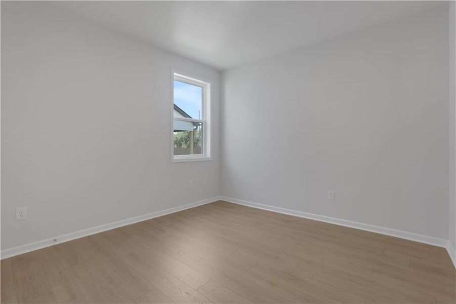 Spacious, unfurnished interior of a new home in The Paddocks at Doc Hughes, Buford (Image 33).