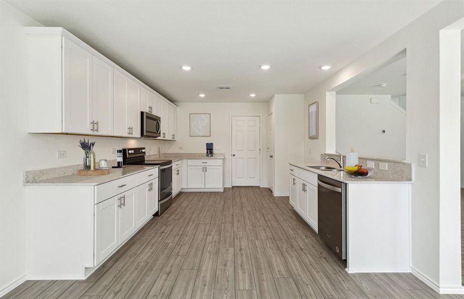 *Model Representation - Abundant cabinet space in kitchen