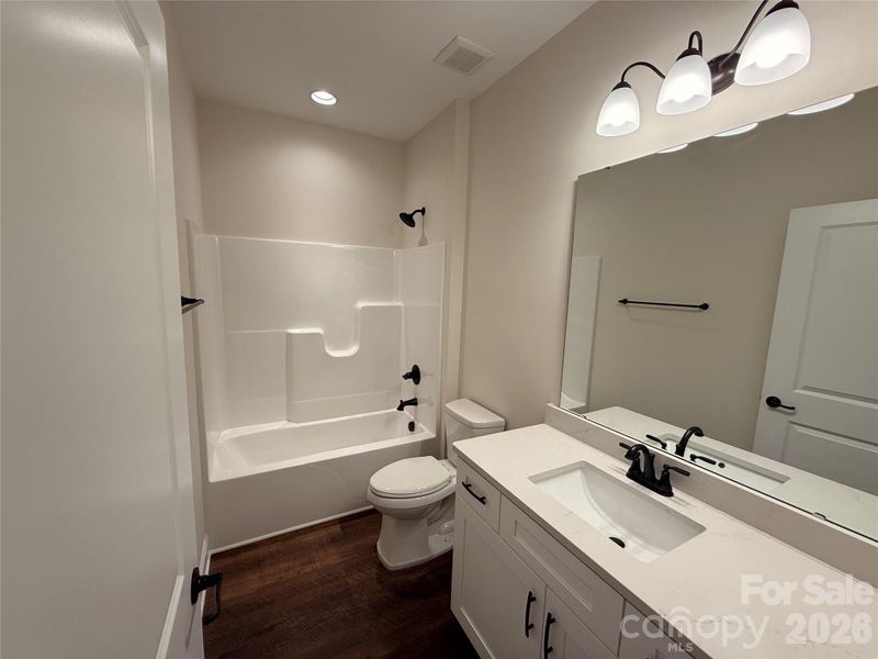 Full hall bathroom on the main level