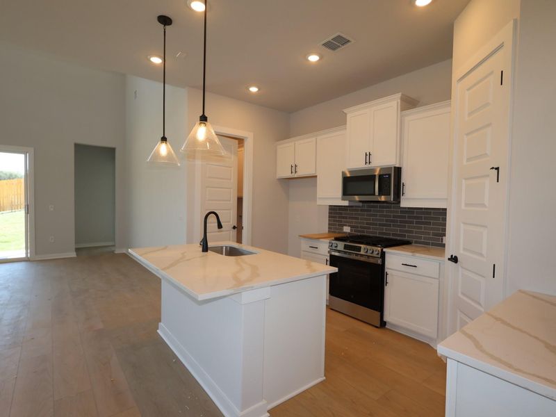Furnished interior view inside a new home in Cedar Brook, Leander (Image 11).