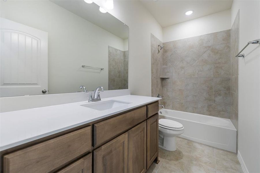 Furnished interior view inside a new home in Clear Sky Addition, Valley View (Image 13).