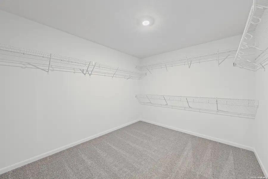 Spacious, unfurnished interior of a new home in Savannah Place, San Antonio (Image 14).