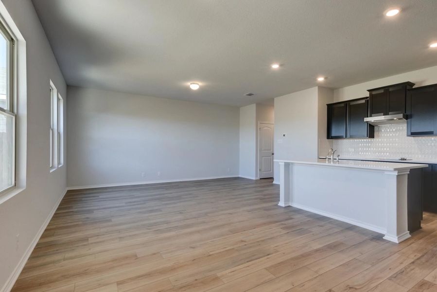 Representative unfurnished interior of a home built from the Dunlap by Ashton Woods in Hennersby Hollow, San Antonio (Image 17). Representative unfurnished interior of a home built from the Dunlap by Ashton Woods in Hennersby Hollow, San Antonio (Image 17).