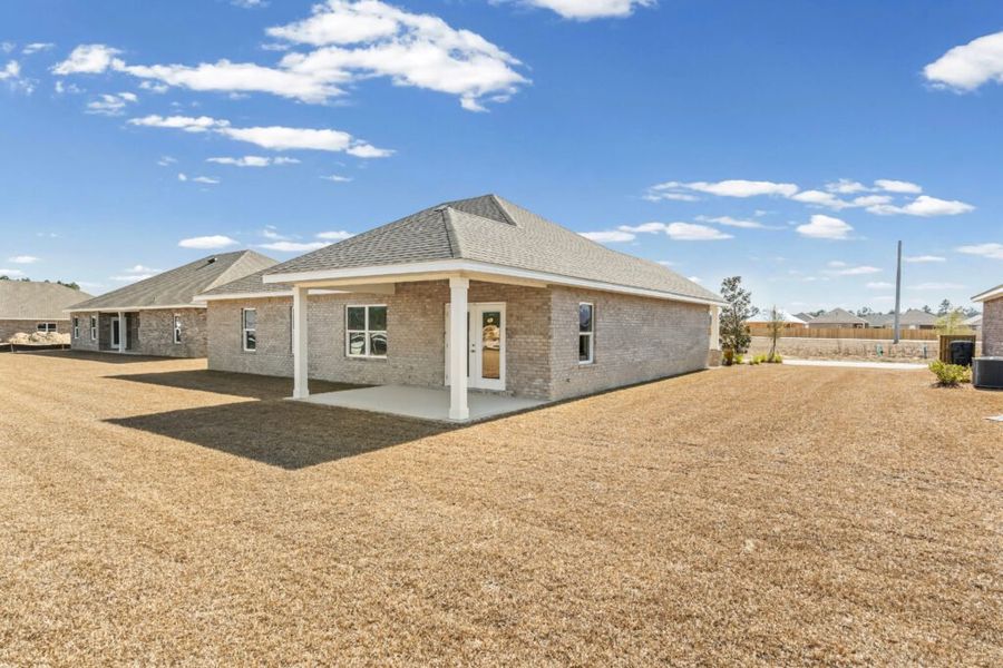 Exterior details and patio area of a home in Natureview, Freeport (Image 25).