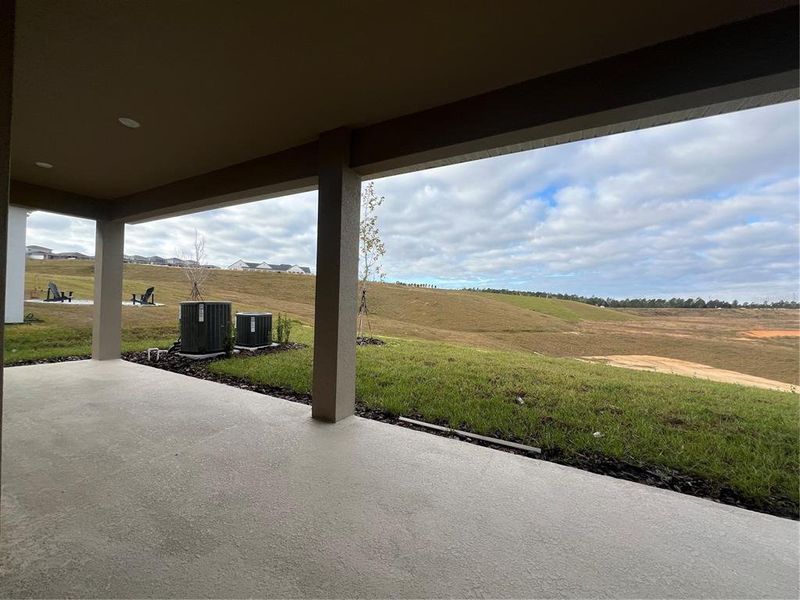 Exterior details and patio area of a home in Hills of Minneola, Minneola (Image 3).