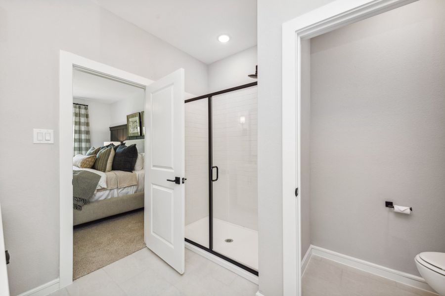 Primary bath with glass shower enclosure