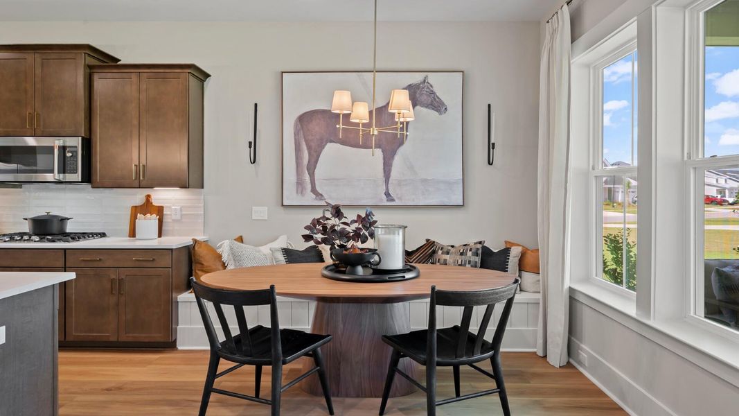 Furnished interior view inside a new home in Summerwind Crossing at Lakes of Cane Bay, Summerville (Image 9).