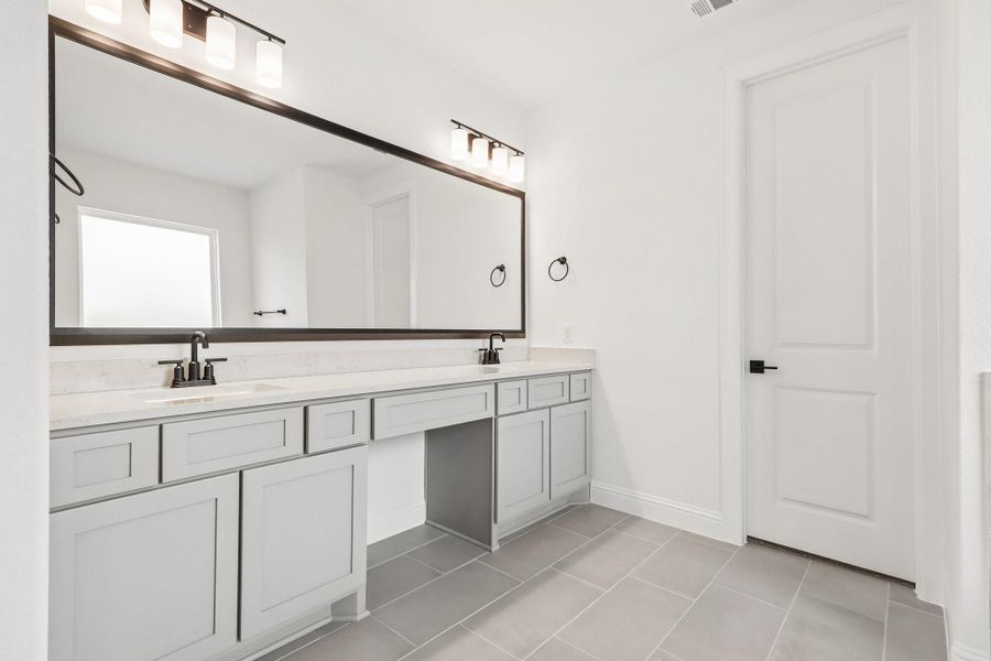 Furnished interior view inside a new home in Woodhavyn 60', Magnolia (Image 12).