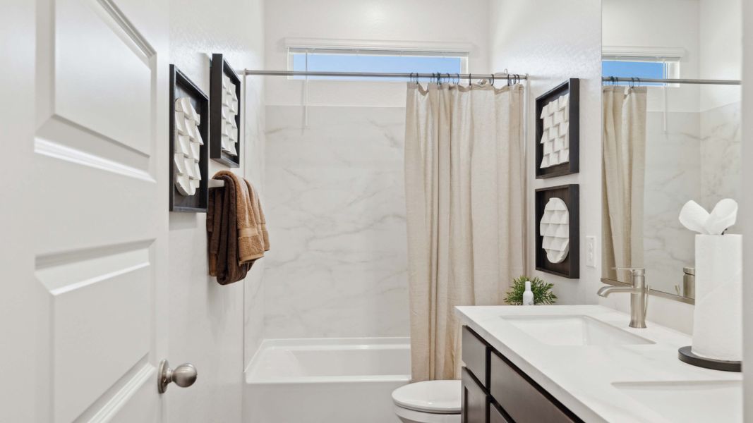 Representative furnished interior of a home built from the Mockingbird by D.R. Horton in Apache Farms, Buckeye (Image 15).