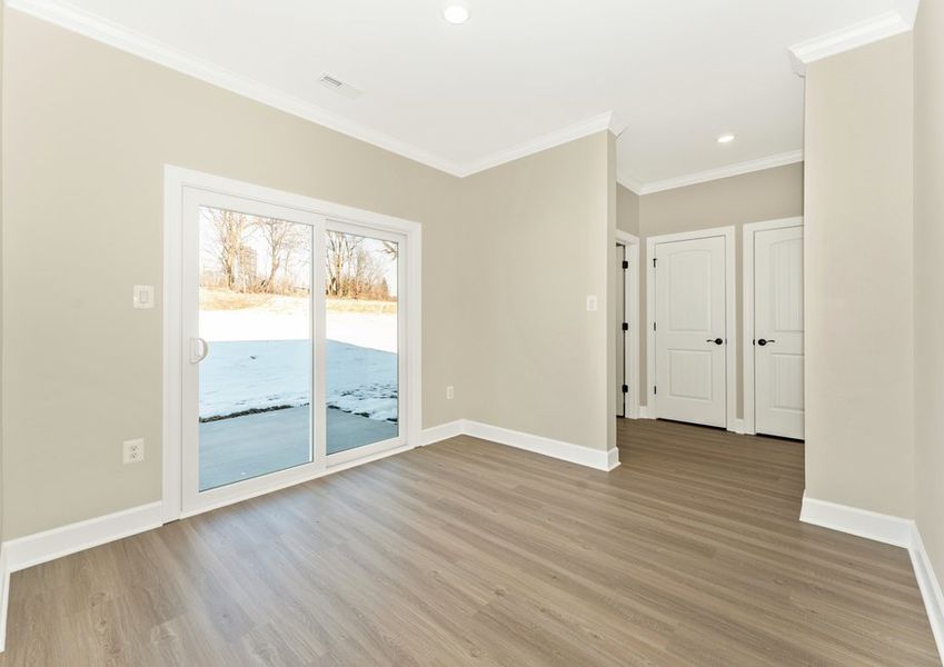 The dining area opens to the backyard The dining area opens to the backyard