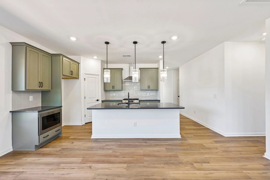 Kitchen featuring the AW Collection® Rosemary - Matte black, light wood, and garden-inspired style. Kitchen featuring the AW Collection® Rosemary - Matte black, light wood, and garden-inspired style.