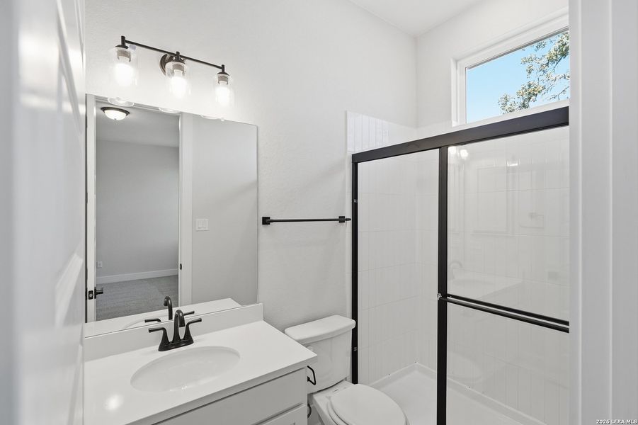 Furnished interior view inside a new home in Potranco Oaks, Castroville (Image 13).