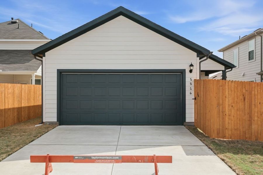 Front exterior of a new home in Longview, Del Valle, TX, highlighting curb appeal (Image 2). Front exterior of a new home in Longview, Del Valle, TX, highlighting curb appeal (Image 2).