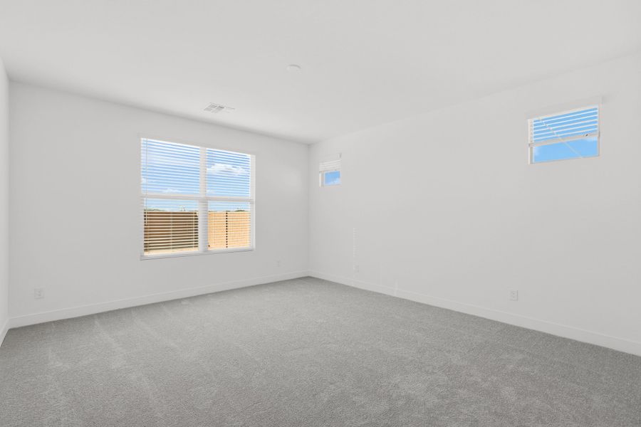 Spacious, unfurnished interior of a new home in Artisan at Asante, Surprise (Image 19).