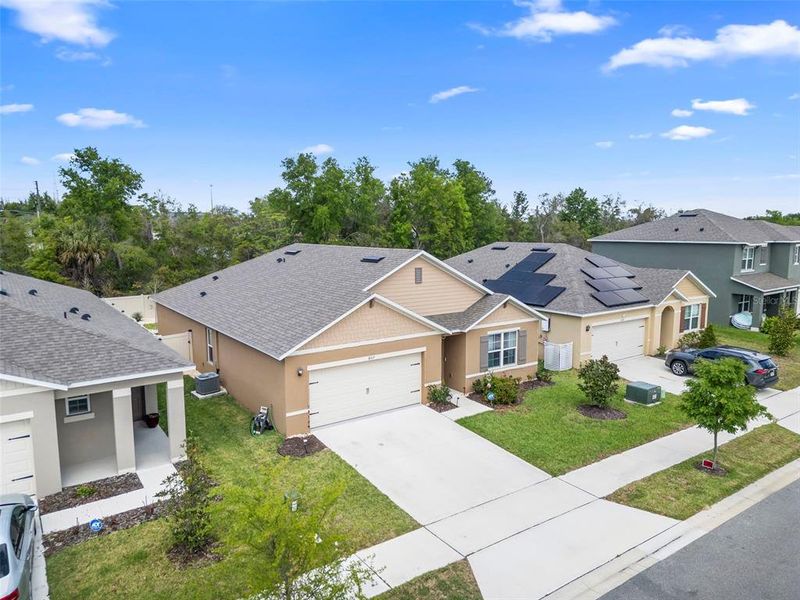 Front exterior of a new home in Cadence at Parc Hill, Orange City, FL, highlighting curb appeal (Image 23).