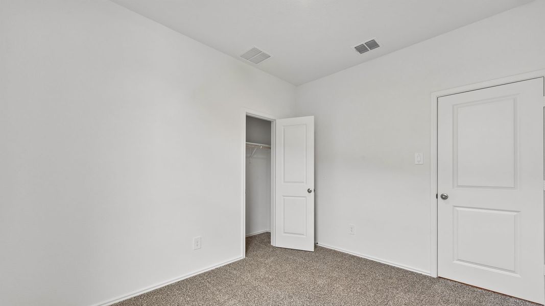 Spacious, unfurnished interior of a new home in Wayside, Uhland (Image 26).