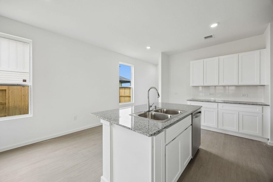 Furnished interior view inside a new home in Windcress, Cove (Image 5).