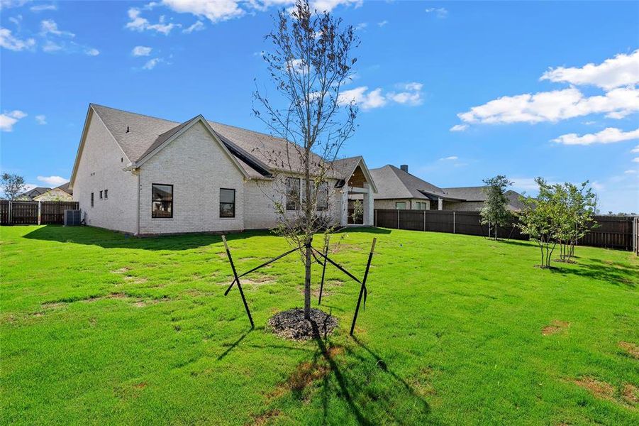 Exterior details and patio area of a home in , Hewitt (Image 30).