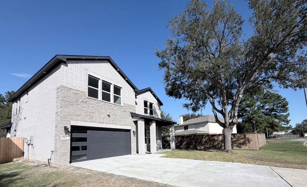 Front exterior of a new home in , Houston, TX, highlighting curb appeal (Image 23).